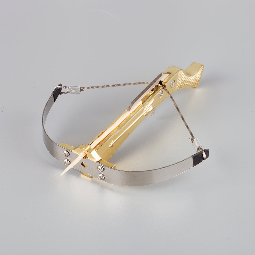 Gold plated bowman crossbow with toothpick loaded 