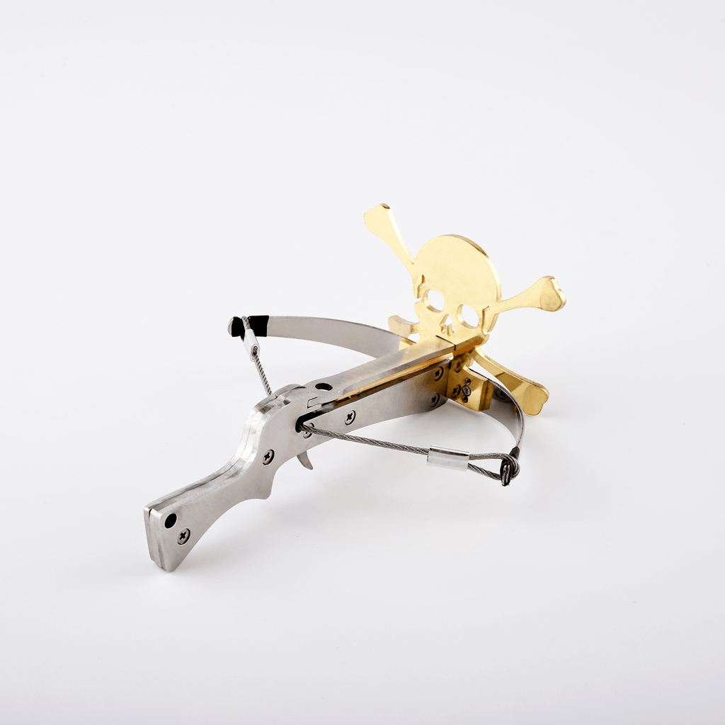 silver and gold skull metal crossbow