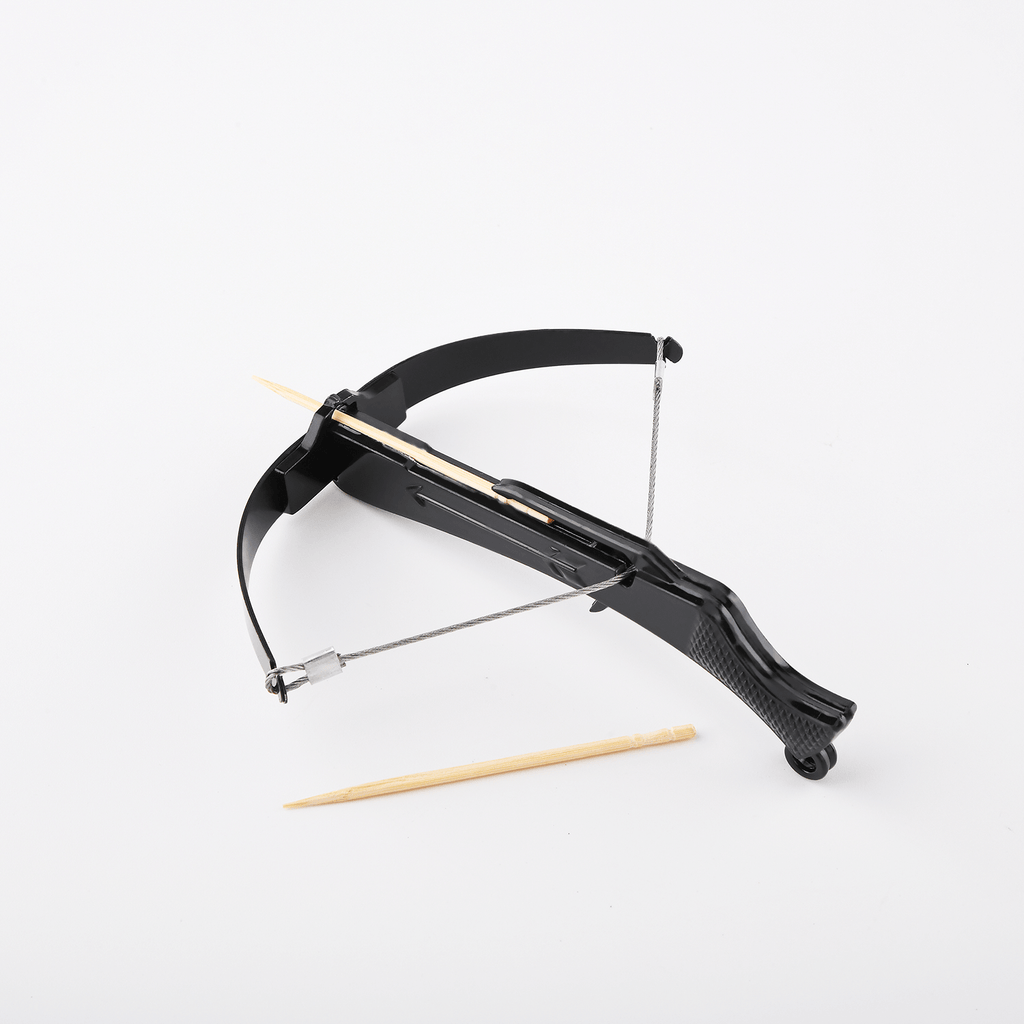 Mini black bowman crossbow loaded with toothpick