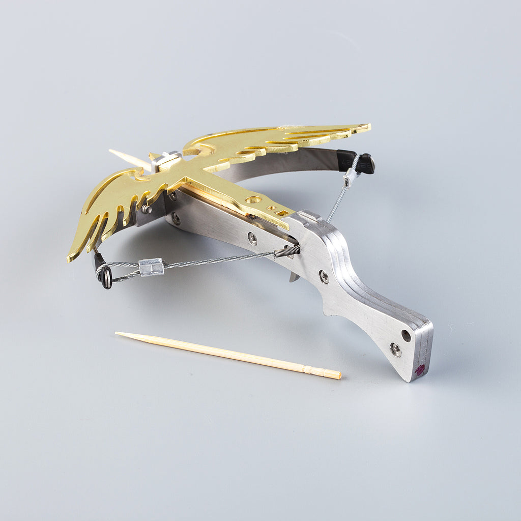 mini steel phoenix crossbow loaded with toothpick