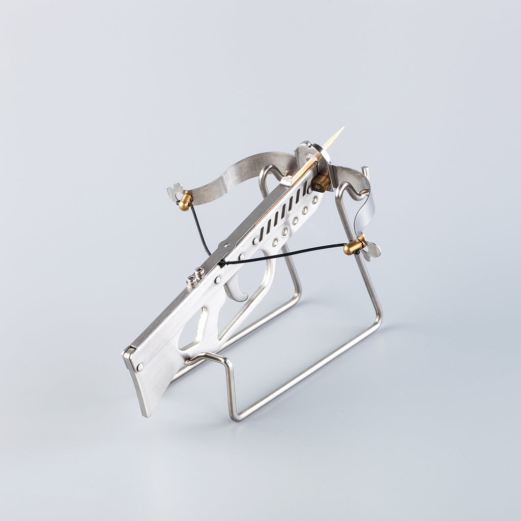 silver thorn metal crossbow on a display stand 