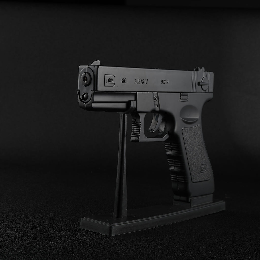 Black Glock 18 butane gun lighter on display stand