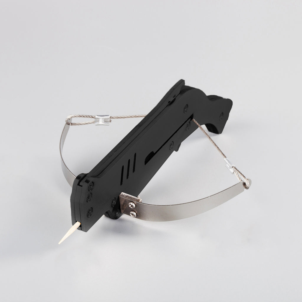 mini black ace sniper bow loaded with toothpick